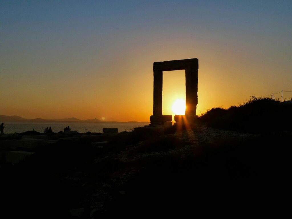 Naxos Portara sunset Greece - best Greek island to avoid Mykonos Santorini crowds